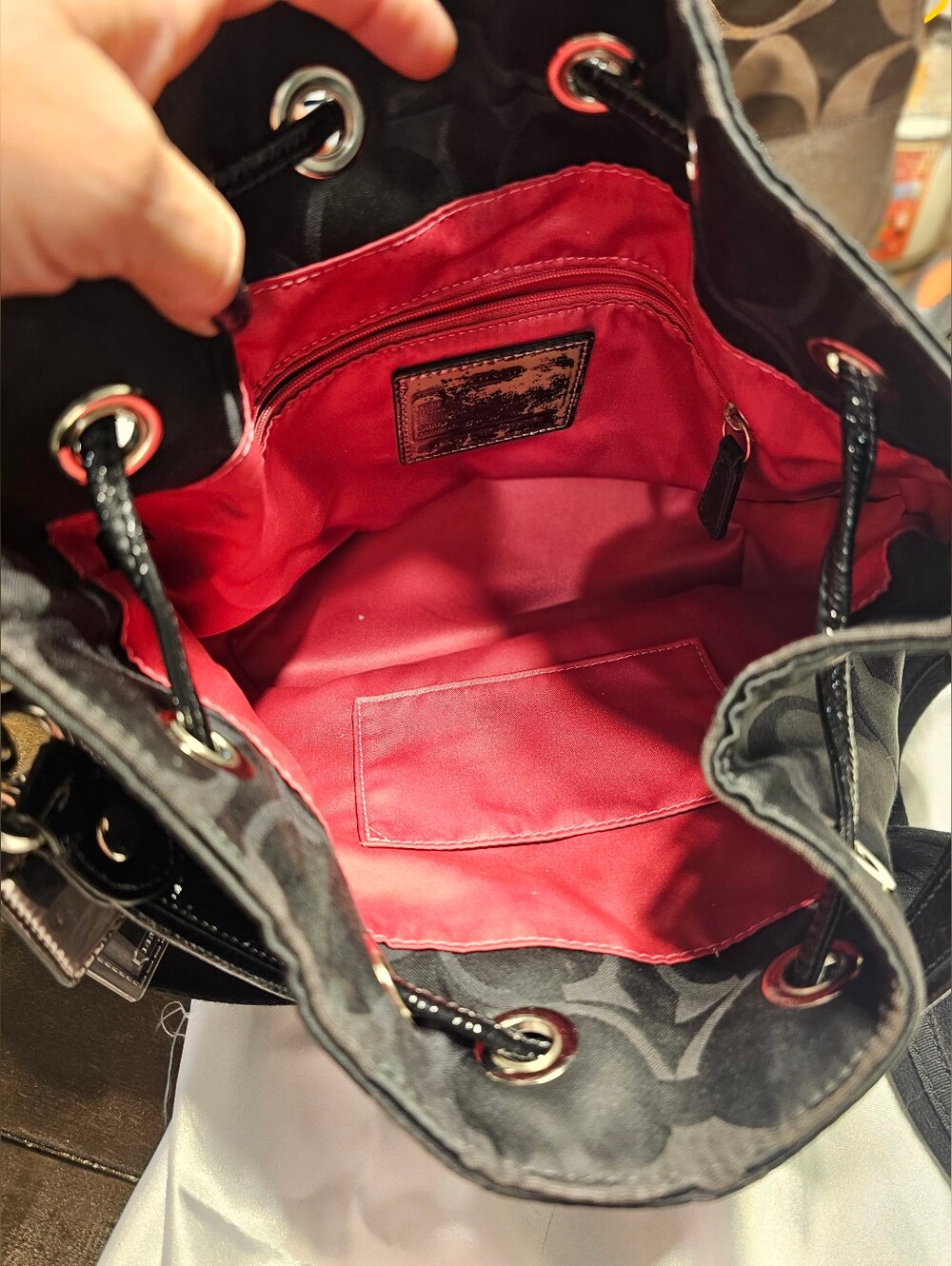Coach Poppy Black Signature Drawstring Bucket/Crossbody Hot Pink Interior - Picture 3 of 11
